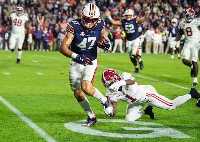 Auburn Tigers tight end John Samuel Shenker (47) breaks free for a touchdown after a catch during overtime during the Iron Bowl at Jordan-Hare Stadium in Auburn, Ala., on Saturday, Nov. 27, 2021. Alabama Crimson Tide defeated Auburn Tigers 24-22 in 4OT.